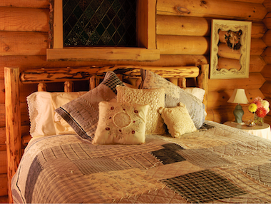 Lakeside-Living_Manitowish-Waters_Northwoods-WI_Bedding-Basics_Log-Cabin-Bedroom_Patchwork-Quilt_Various-Decorative-Pillows